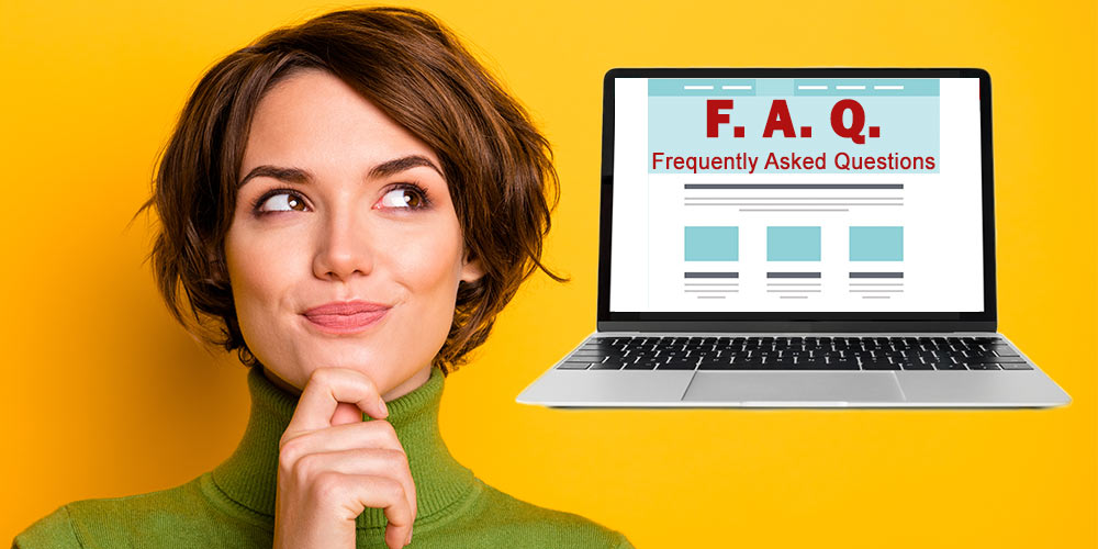 smiling lady looking at computer with frequently asked website questions on screen